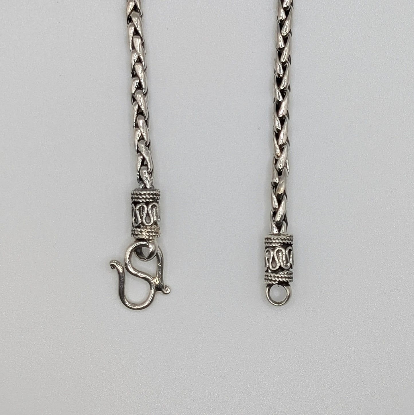 Polished sterling silver Spiga chain Bracelet with S-Hook Clasp Closure.