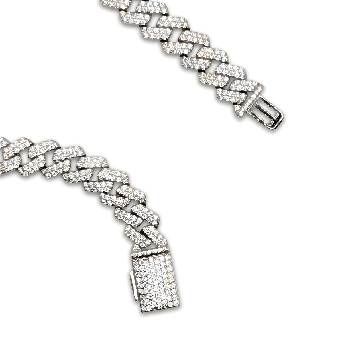 A silver-toned Cuban link chain bracelet paved with clear cubic zirconia stones.