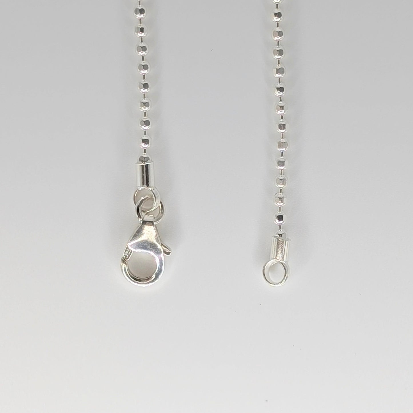 925 Sterling Silver Ball Chain with lobster clasp closure.