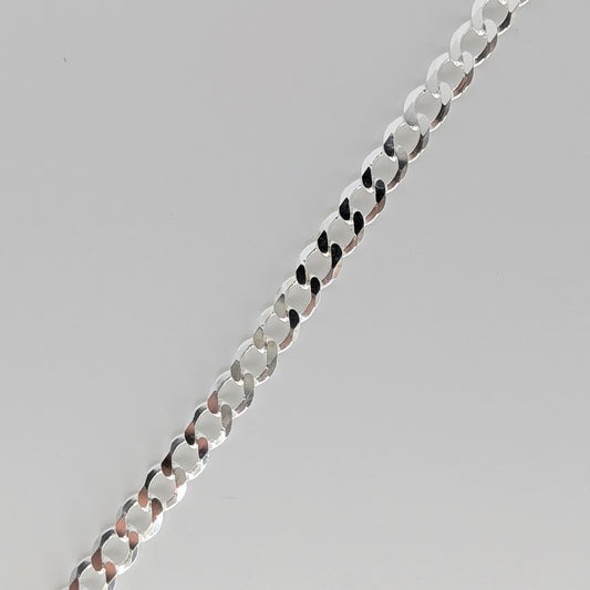 Polished sterling silver chain necklace with flat, circular links.