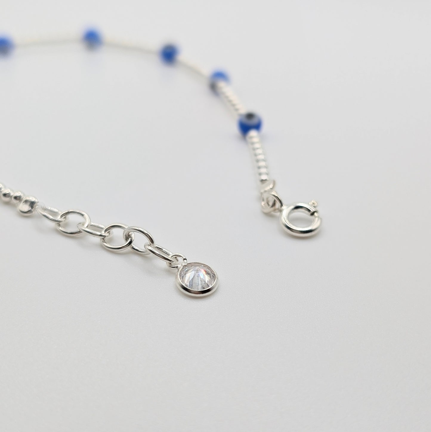 Handmade 925 Sterling Silver Evil Eye Bracelet with Spring clasp closure. 