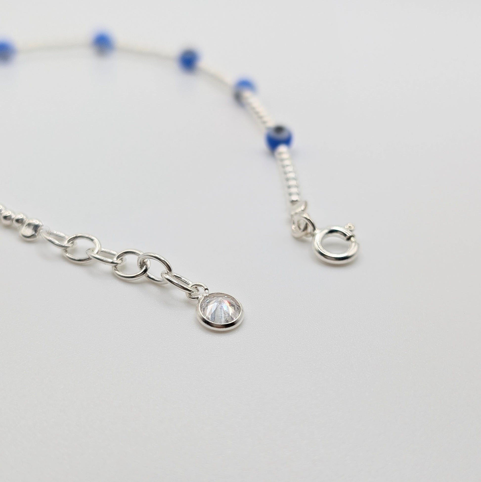 Handmade 925 Sterling Silver Evil Eye Bracelet with Spring clasp closure. 
