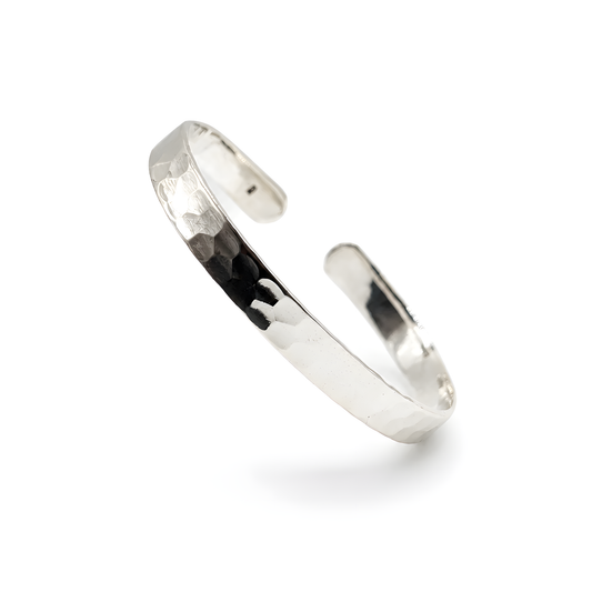 A polished silver open cuff bracelet with a hammered texture on one side and a smooth finish on the other.