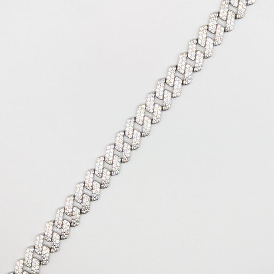 Sterling Silver Iced Curb Cuban Chain Bracelet with brilliant mini Zircon Stones embedded on it.