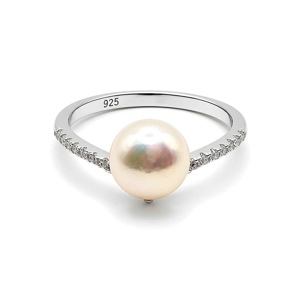 A sterling silver ring featuring a large, lustrous cream pearl set in a pavé diamond band.