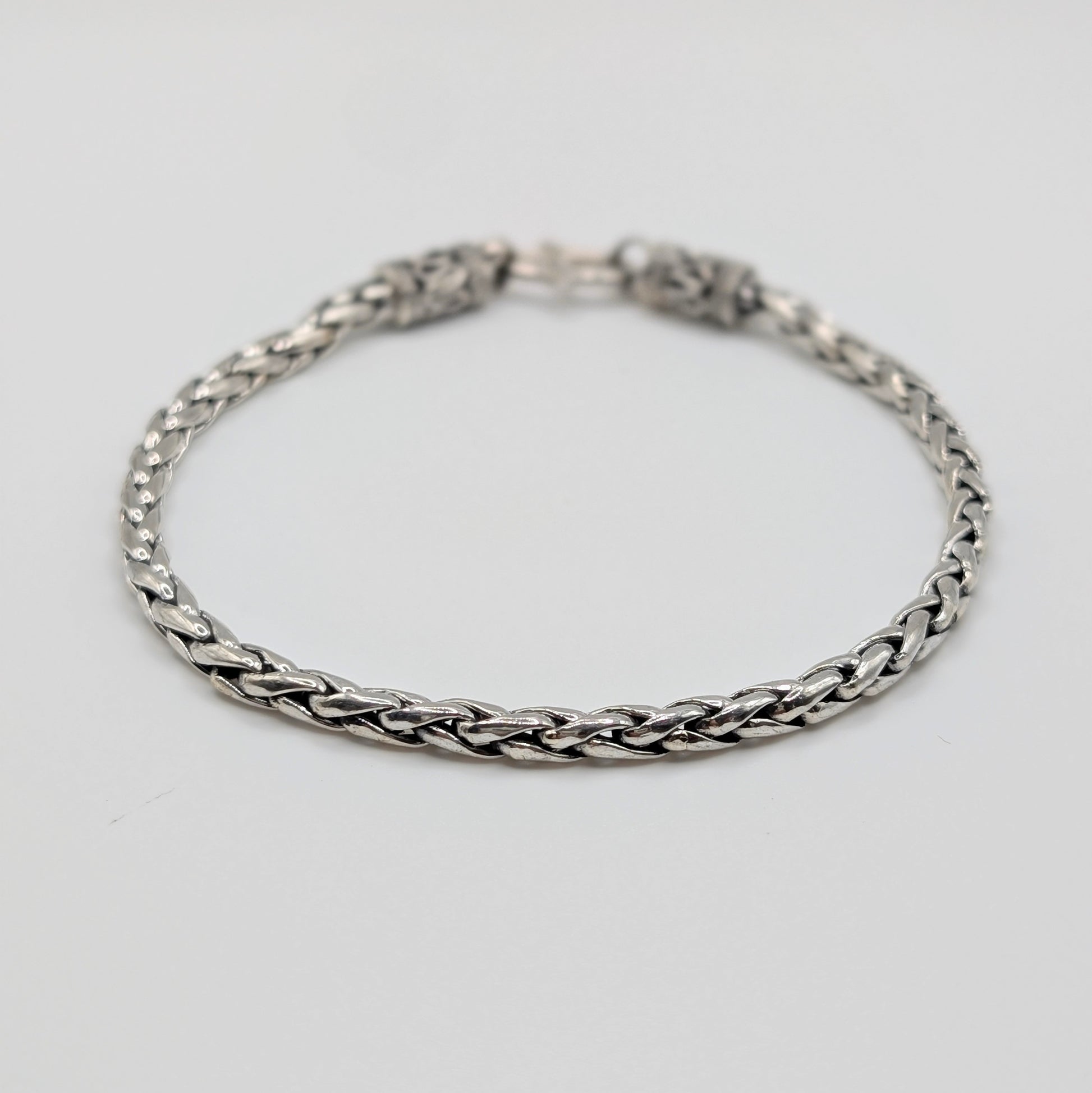 Polished sterling silver Spiga chain Bracelet with braided like design.