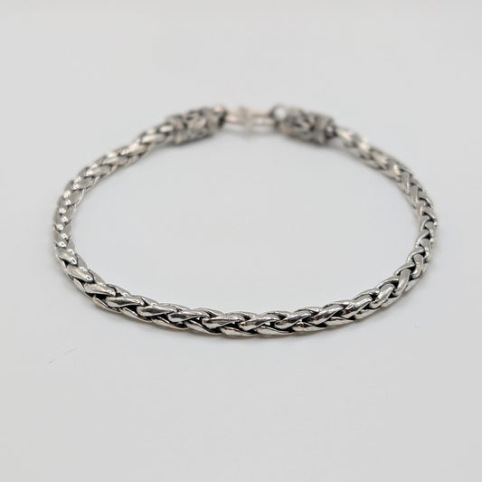 Polished sterling silver Spiga chain Bracelet with braided like design.