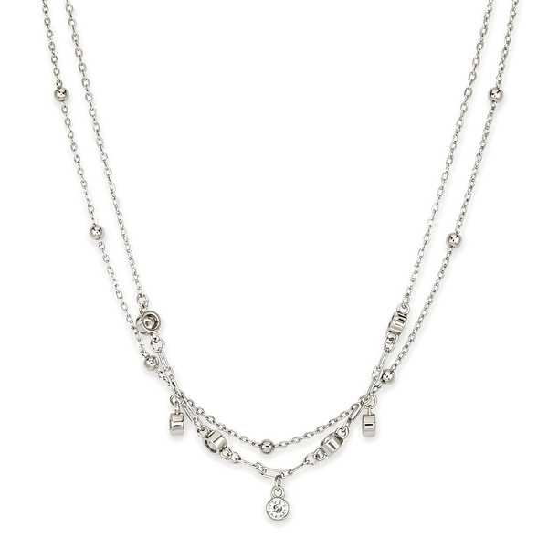 A sterling silver double-layer necklace featuring delicate chain straps, small bead accents, and a teardrop-shaped clear gemstone pendant at the center.