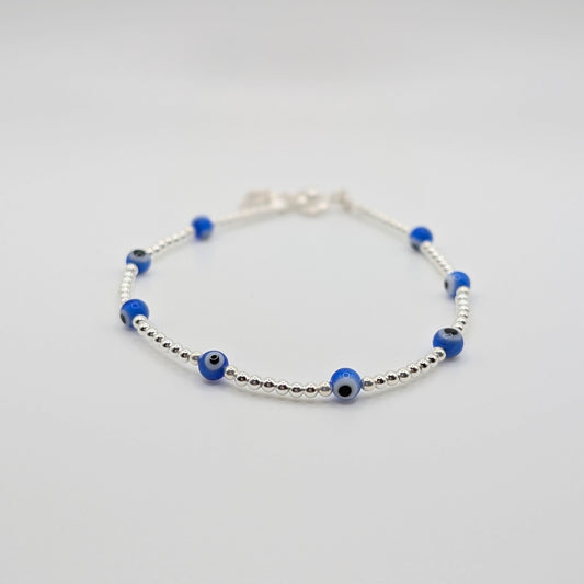 Handmade 925 Sterling Silver Evil Eye Bracelet with silver beads.