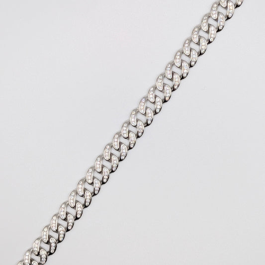 Sterling Silver Iced Curb Cuban Chain Bracelet with brilliant mini Zircon Stones embedded on it.