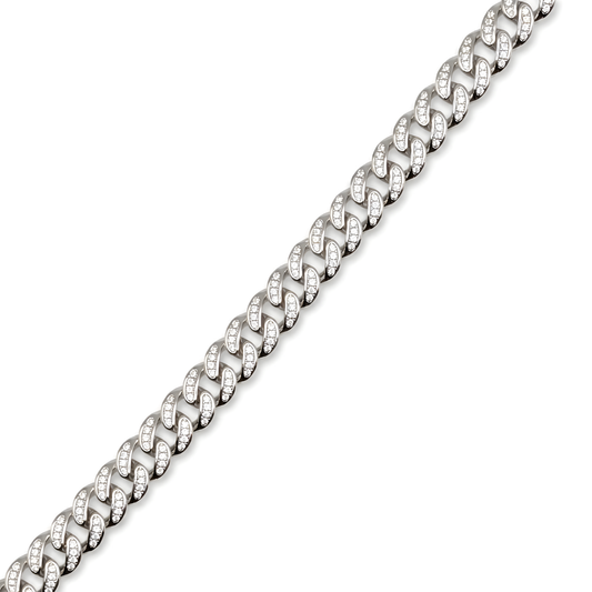 A silver-tone Pave Cuban link chain bracelet with clear cubic zirconia set in each link.