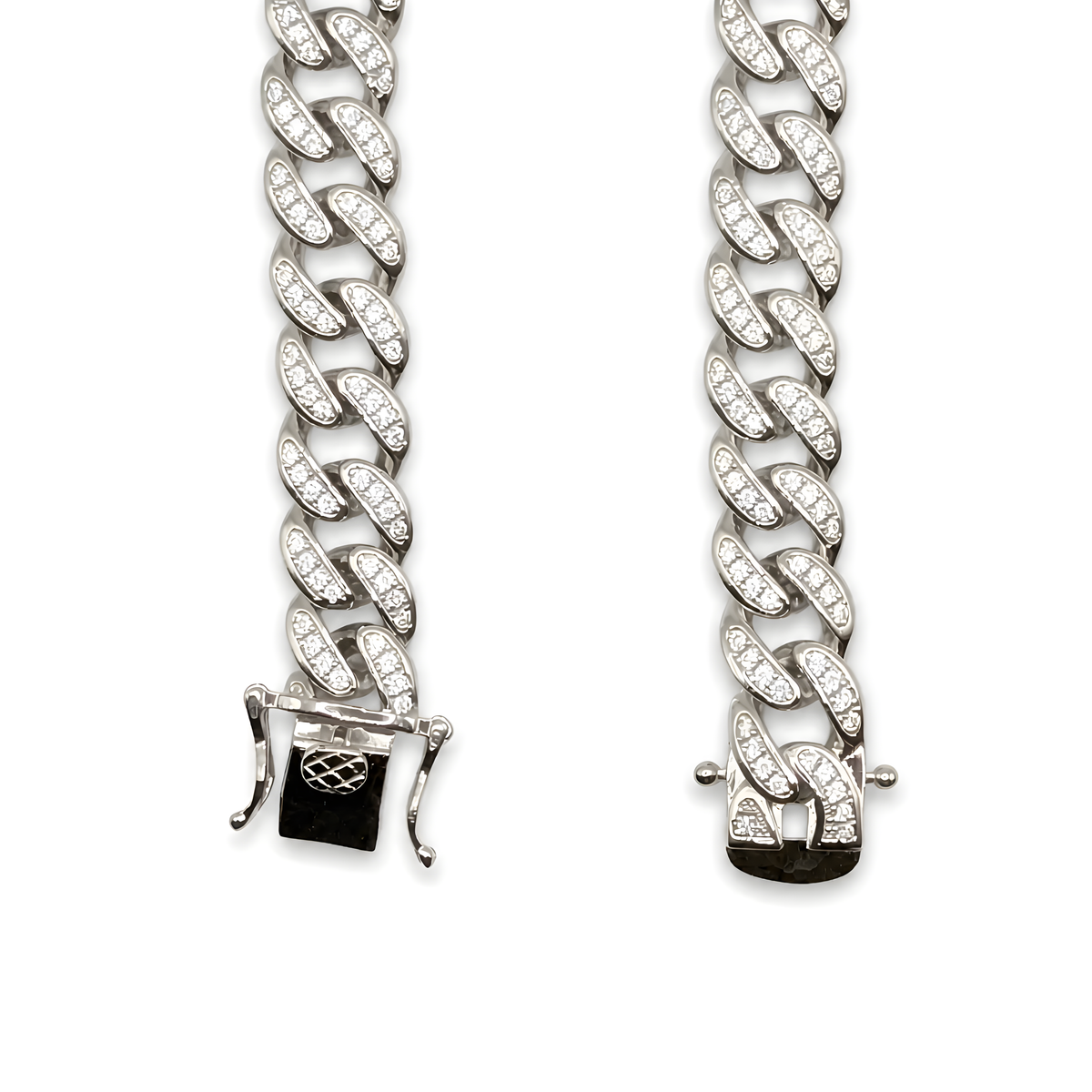 A silver-tone Cuban link chain bracelet with pavé-set clear stones, shown from both the front and back clasp.