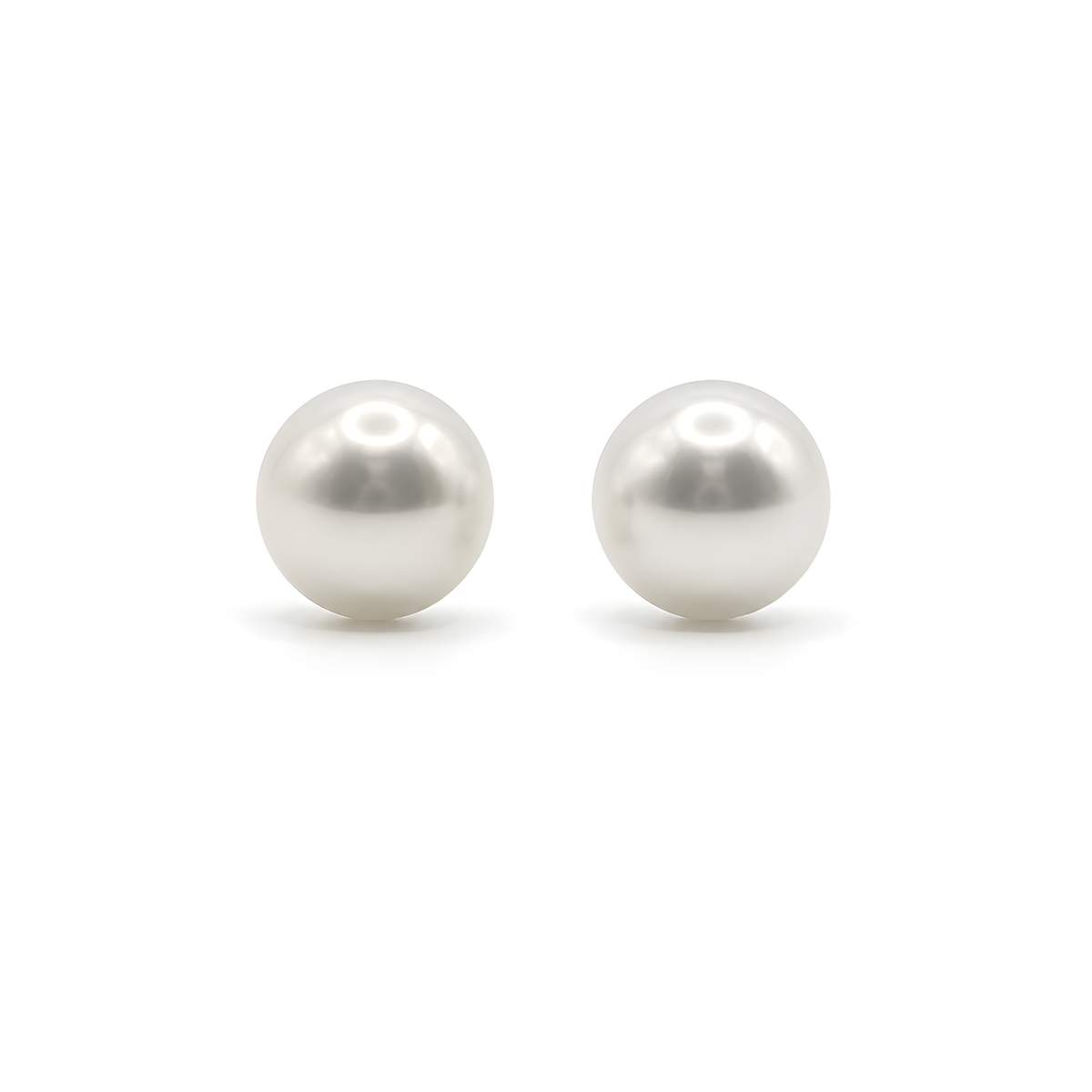 A pair of round white freshwater pearls stud earrings.