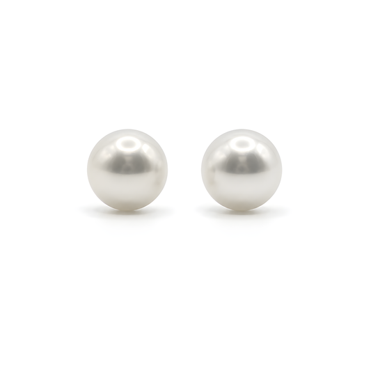 A pair of round white freshwater pearls stud earrings.